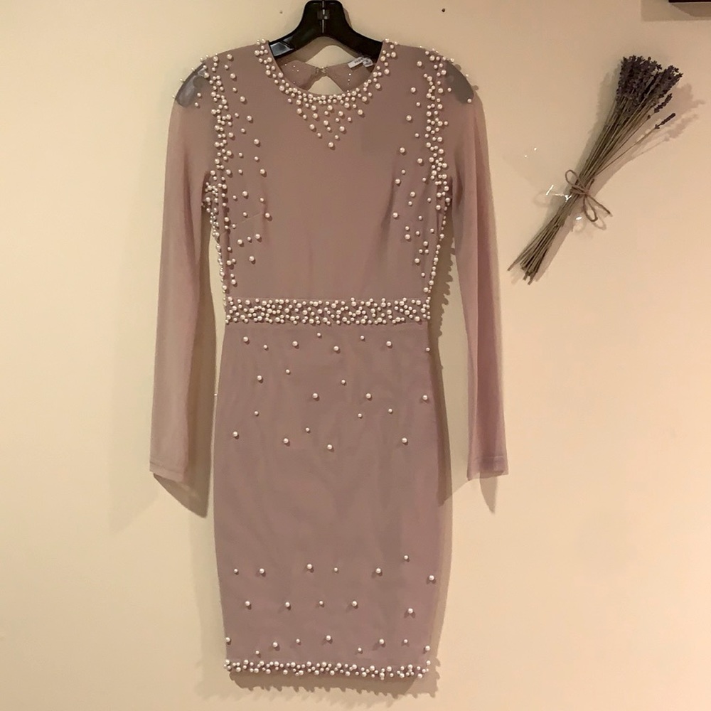 Pearl long-sleeve body-con dress.